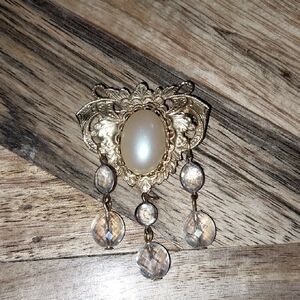 Elegant Signed Joelian Gold Toned and Cream Brooch with Faceted Accents
